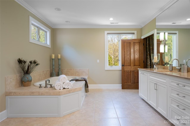 bathroom featuring vanity, a bathtub, and a wealth of natural light