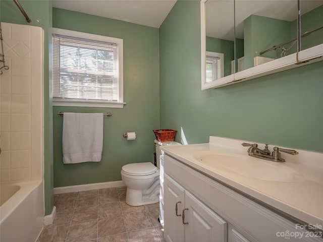 full bathroom with vanity, toilet, tile patterned floors, and shower / tub combination