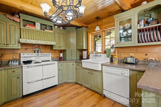 kitchen featuring white appliances, sink, hanging light fixtures, and wooden ceiling