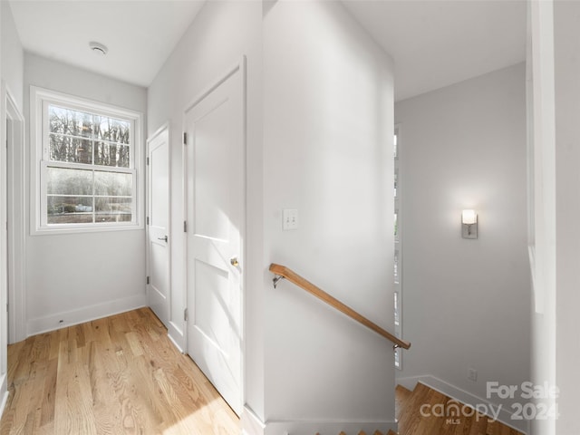 corridor featuring light hardwood / wood-style flooring