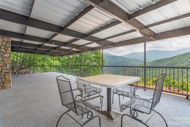 view of patio / terrace with a mountain view