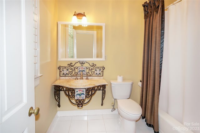 full bathroom featuring shower / bath combination with curtain, tile floors, toilet, and vanity with extensive cabinet space