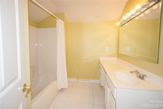 bathroom with shower / bath combo with shower curtain, large vanity, and tile flooring