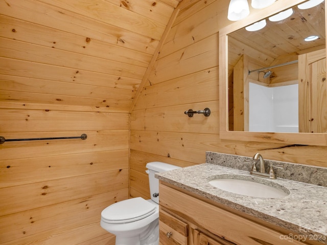 bathroom featuring wooden walls, wood ceiling, lofted ceiling, and toilet