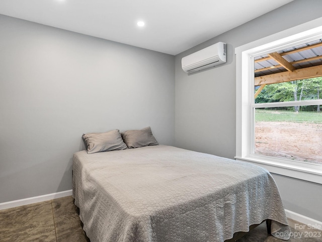 tiled bedroom featuring an AC wall unit