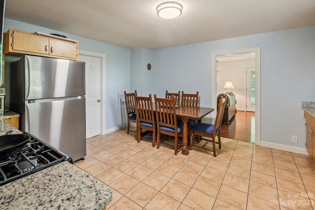 view of tiled dining area