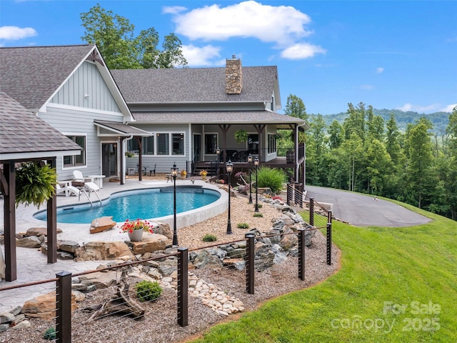 1590 S 226th Hwy, Bakersville, NC 28705 - pool featuring a yard, a patio area, and fence