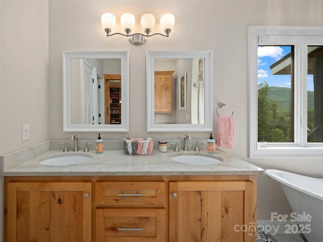 1590 S 226th Hwy, Bakersville, NC 28705 - bathroom with a freestanding bath, a sink, and double vanity