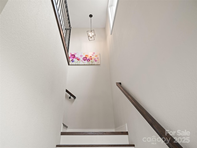 1590 S 226th Hwy, Bakersville, NC 28705 - stairway with a chandelier