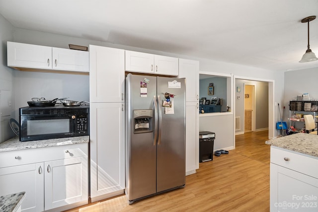 kitchen with light wood-type flooring, white cabinetry, and stainless steel fridge with ice dispenser