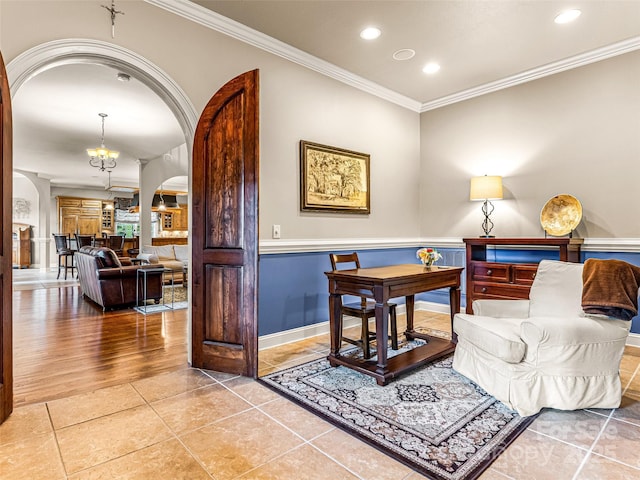 202 Emerald Ln, Maggie Valley, NC 28751 - sitting room with arched walkways, crown molding, recessed lighting, a chandelier, and tile patterned flooring