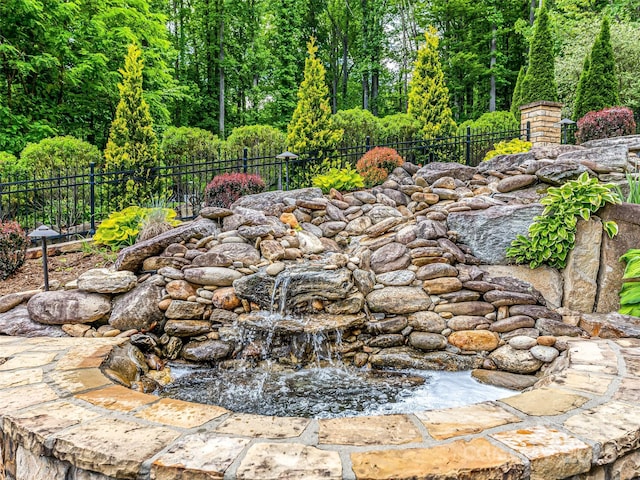 202 Emerald Ln, Maggie Valley, NC 28751 - exterior view of a small pond and fence