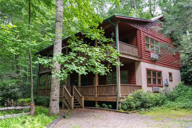 view of property exterior featuring a balcony