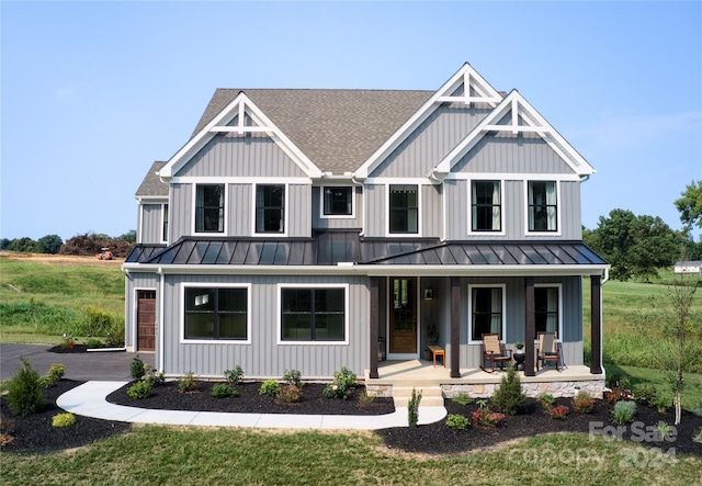 view of front of home featuring covered porch