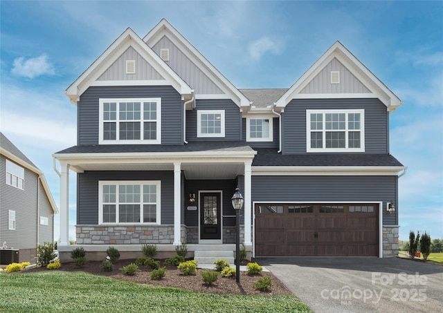 11330 James Coy Rd Covington, Unit Covington, Davidson, NC 28036 - craftsman house featuring board and batten siding, stone siding, a garage, and asphalt driveway