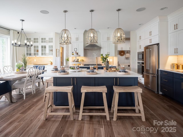 11330 James Coy Rd Covington, Unit Covington, Davidson, NC 28036 - kitchen with appliances with stainless steel finishes, a chandelier, light countertops, white cabinets, and recessed lighting