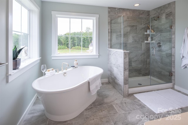 11330 James Coy Rd Covington, Unit Covington, Davidson, NC 28036 - full bathroom with a freestanding bath, a shower stall, marble finish floors, and recessed lighting