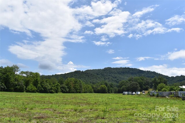 property view of mountains featuring a rural view