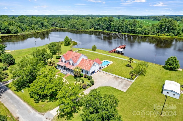 drone / aerial view with a water view