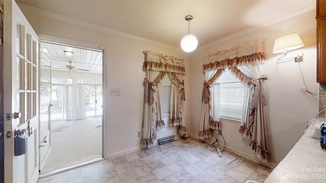 entryway featuring light tile floors, ceiling fan, and ornamental molding