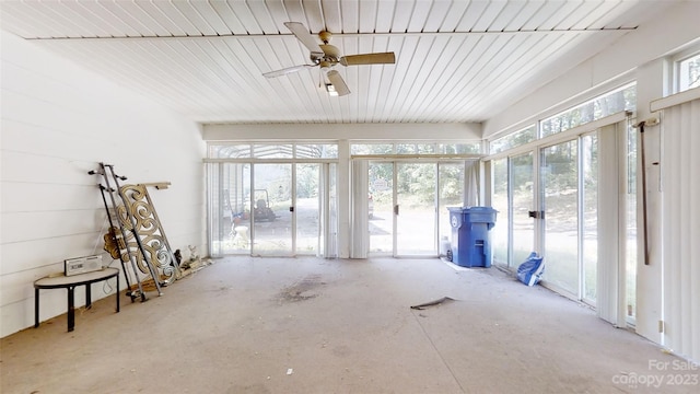 sunroom with plenty of natural light and ceiling fan