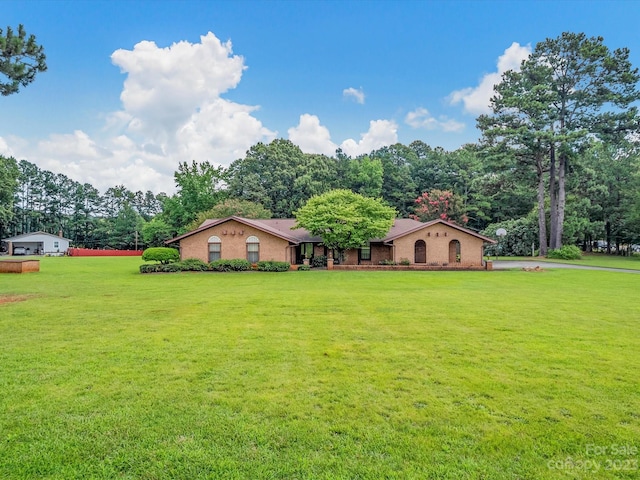 view of front of house with a front lawn