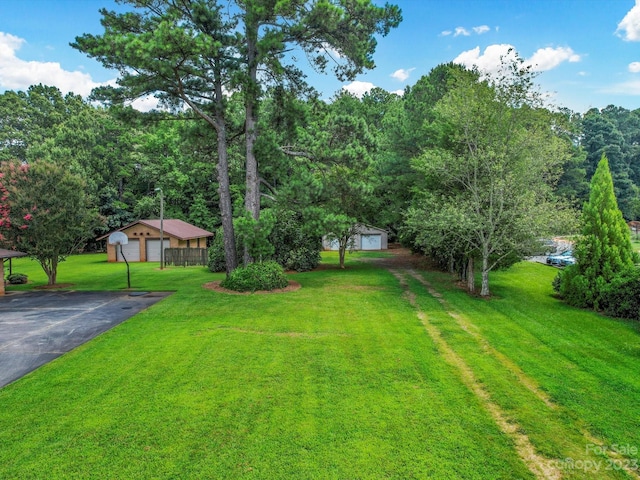 view of yard with a garage