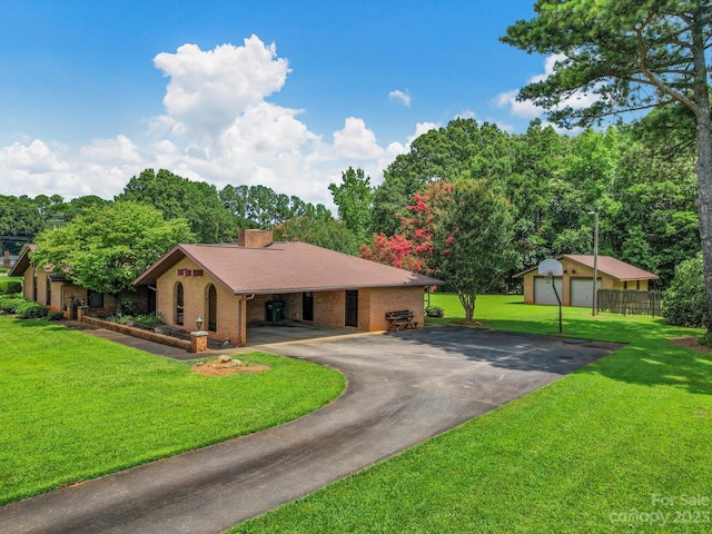 ranch-style house with a front lawn and a garage