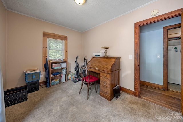 office with a textured ceiling, crown molding, and light hardwood / wood-style floors