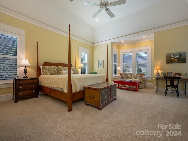 carpeted bedroom with crown molding and ceiling fan