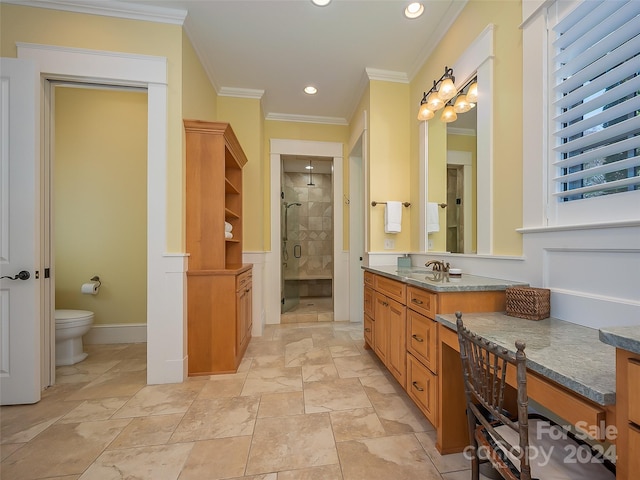 bathroom featuring toilet, tile floors, a shower with shower door, and vanity