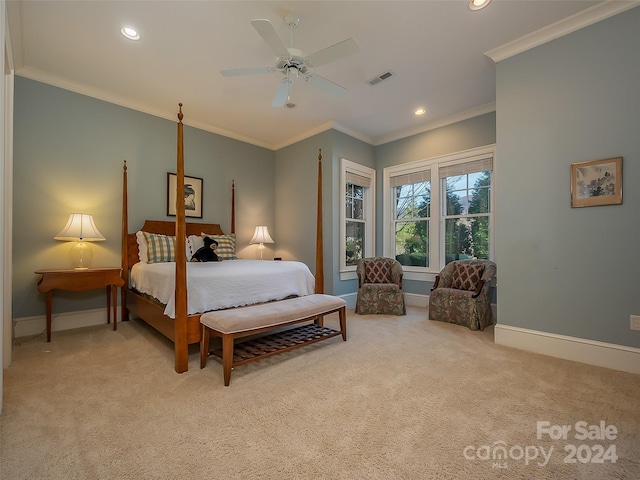 bedroom featuring crown molding, ceiling fan, and light colored carpet