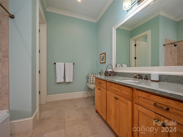 bathroom featuring vanity, tile flooring, and crown molding