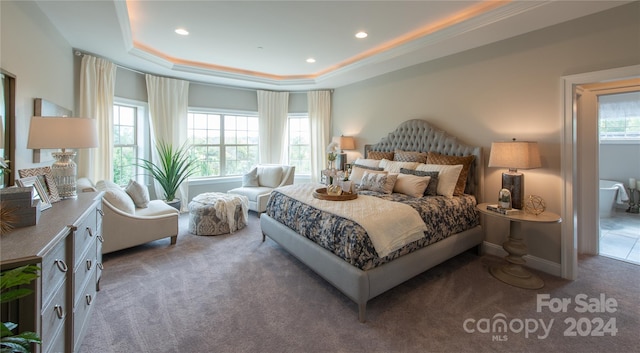 bedroom featuring recessed lighting, baseboards, a raised ceiling, and carpet flooring