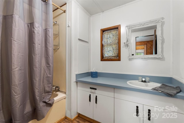 bathroom with vanity and shower / bath combo with shower curtain