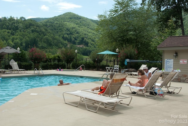 view of pool with a patio