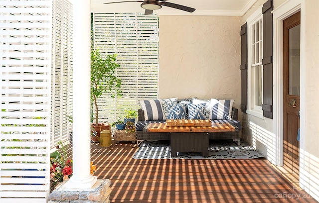 balcony featuring ceiling fan