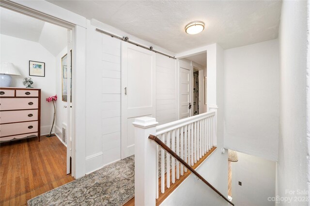 hallway featuring hardwood / wood-style floors