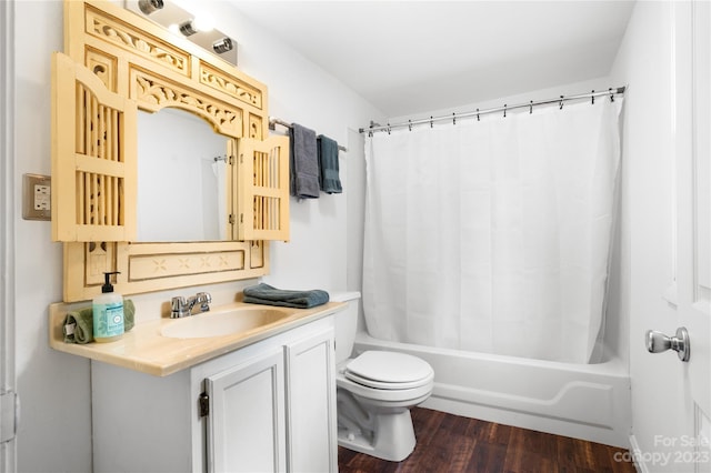 full bathroom with vanity, toilet, hardwood / wood-style flooring, and shower / bath combo with shower curtain