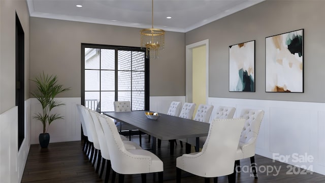 dining room with an inviting chandelier, dark wood-type flooring, and ornamental molding