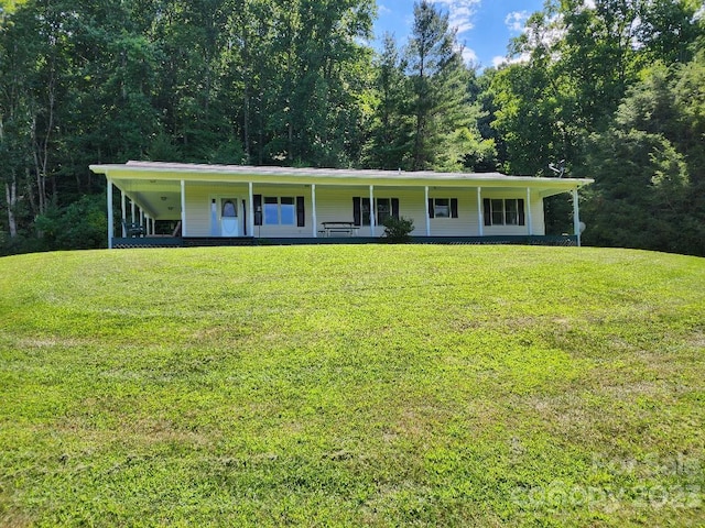 view of front of house featuring a front yard and a porch