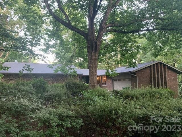 view of home's exterior with a garage