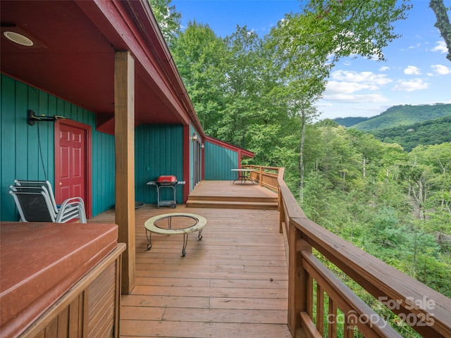 wooden terrace featuring a mountain view