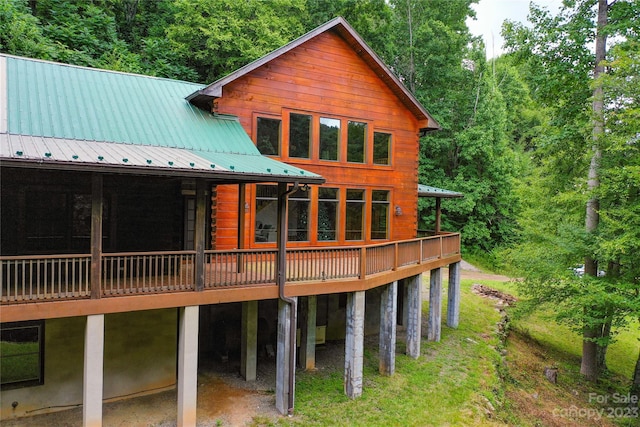 rear view of house with a deck