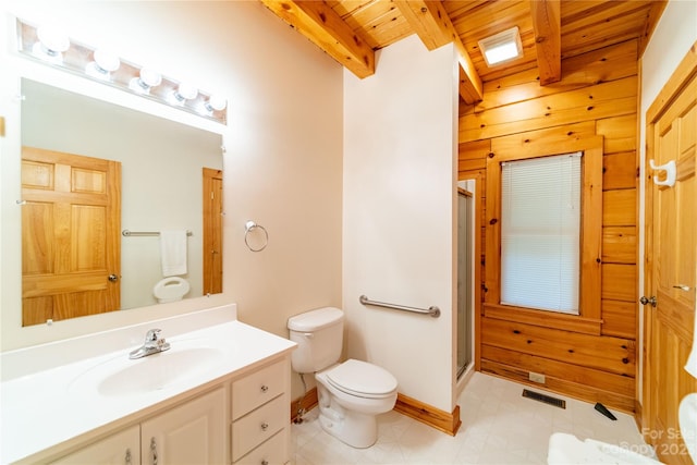 bathroom featuring vanity, beamed ceiling, tile floors, wooden ceiling, and toilet