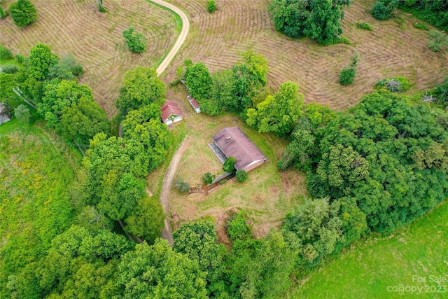 birds eye view of property featuring a rural view