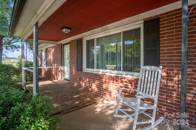 view of patio featuring a porch