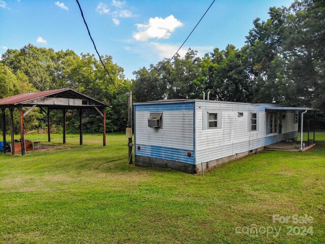 exterior space with a yard and a gazebo