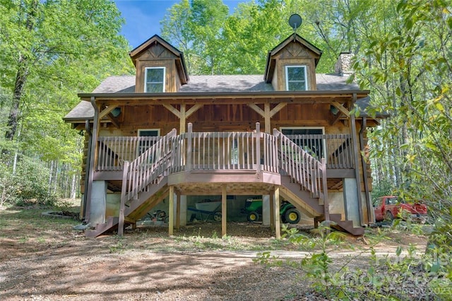 exterior space featuring a wooden deck