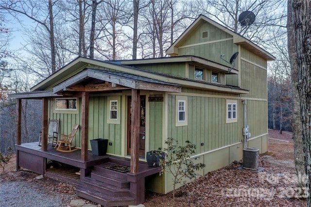 back of property featuring central air condition unit